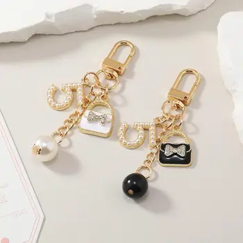 מעולה ריינסטון תיק בצורת מחזיק מפתחות אופנה חיקוי פרל מספר 5 מפתח טבעת טלפון שרשרת נשים תליון תיק תכשיטים מתנה